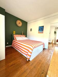 Postel nebo postele na pokoji v ubytování Appartement Clim Wifi Tendance