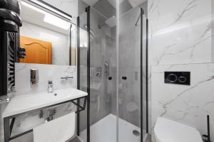 Koupelna v ubytování Hotel Nikolas