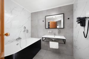 Koupelna v ubytování Hotel Nikolas