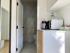 A cozinha ou kitchenette de Xen Pool Access