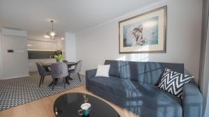 Et opholdsområde på Apartmán Donizetti D 10