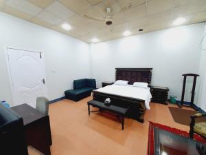 Posezení v ubytování Business Lodges Gujrat