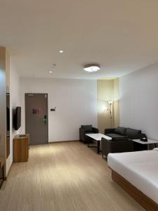 TV a/nebo společenská místnost v ubytování Hotel Ivory Papar