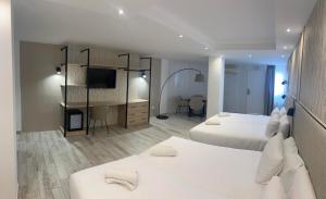 Postel nebo postele na pokoji v ubytování Hotel Zen Airport + 37 fotografií
