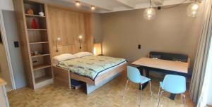 Posteľ alebo postele v izbe v ubytovaní Alpenappartements Domicil include Jokercard
