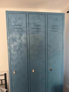 two metal lockers sitting next to each other at Pelini - 3 in Szentendre +14 photos