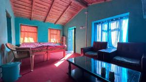 Photo de la galerie de l'établissement Joshi Cottage Binsar, à Almora