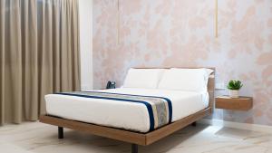 Postel nebo postele na pokoji v ubytování Hotel Diana