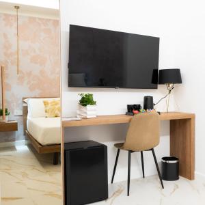 TV a/nebo společenská místnost v ubytování Hotel Diana