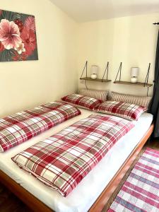 Postel nebo postele na pokoji v ubytování Les Petites Ecuries - Gîte Ponpon