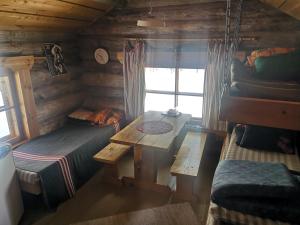 Katil atau katil-katil dalam bilik di Wilderness Cabin on a Private Island