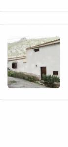 a picture of a white building at Baglio Marotta in Valderice