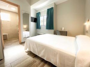 Postel nebo postele na pokoji v ubytování Te Maná Hotel