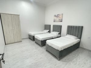 Postel nebo postele na pokoji v ubytování AL Rabie Resort ,Nizwa Grand Mall