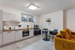 Kuchyň nebo kuchyňský kout v ubytování Tua Casa - Souterrain Appartment