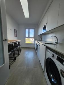 Η κουζίνα ή μικρή κουζίνα στο Apartamento Playa San Juan 1