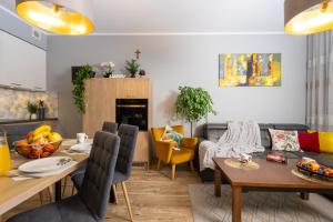Et opholdsområde på Apartament ZEUS - Beskid Apartment