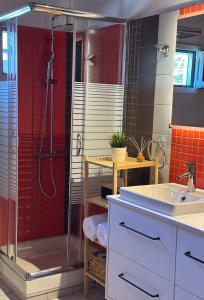 a bathroom with a shower and a sink at Villa Afrodite in Kórinthos +16 photos