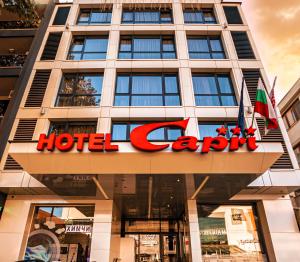 a hotel caribbean sign on the front of a building at Hotel Capri in Plovdiv