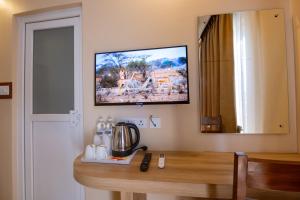 Een TV en/of entertainmentcenter bij Hotel Quest
