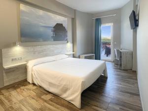 Postel nebo postele na pokoji v ubytování Te Maná Hotel