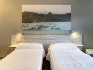 Postel nebo postele na pokoji v ubytování Te Maná Hotel