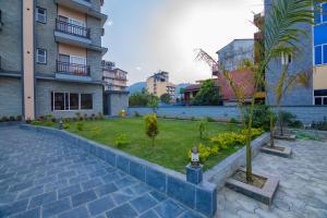 Een tuin van Hotel Quest