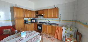 Kuchyň nebo kuchyňský kout v ubytování La casa dei nonni