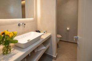 A bathroom at Depalyma Suites