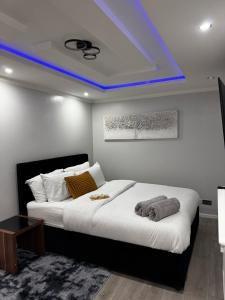 Ένα ή περισσότερα κρεβάτια σε δωμάτιο στο Paramount Luxe Loft- 3 bedrooms, 4 beds cosy home