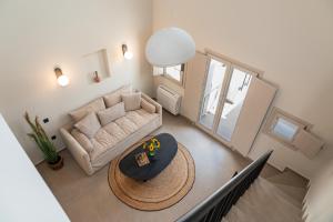 A seating area at Depalyma Suites