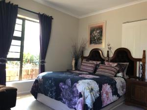 Ένα ή περισσότερα κρεβάτια σε δωμάτιο στο Charming Self-Catering Apartment
