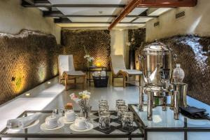 Příslušenství pro přípravu čaje a kávy v ubytování Hotel Lunetta