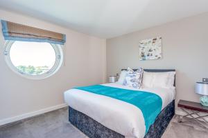 Cama ou camas em um quarto em Captain's Club Hotel & Spa