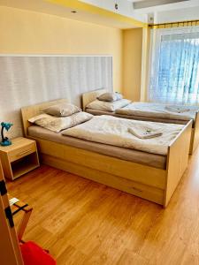 Postel nebo postele na pokoji v ubytování Vila Adéla - Teplice