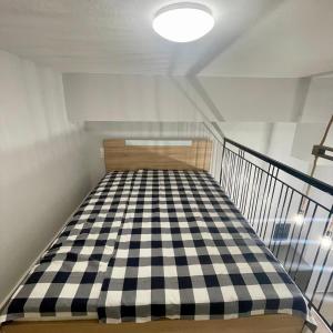 Posteľ alebo postele v izbe v ubytovaní SKG Loft + 18 fotografií