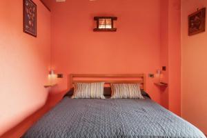 Postel nebo postele na pokoji v ubytování Petite Maison Tillier