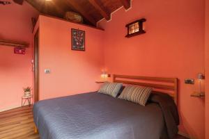 Postel nebo postele na pokoji v ubytování Petite Maison Tillier