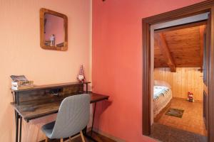 Postel nebo postele na pokoji v ubytování Petite Maison Tillier