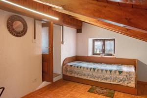 Postel nebo postele na pokoji v ubytování Petite Maison Tillier