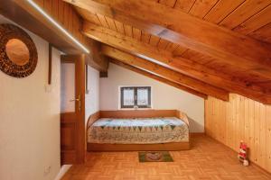 Postel nebo postele na pokoji v ubytování Petite Maison Tillier