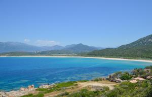 a view of a body of water with mountains at Gorgeous Stacaravan In Casalabriva in Casalabriva +8 photos