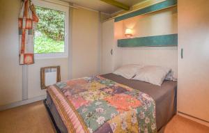 a bedroom with a bed and a window at Gorgeous Stacaravan In Casalabriva in Casalabriva