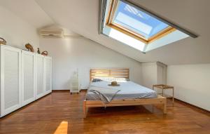 A bed or beds in a room at Stunning Home In Celle Ligure Sv,