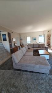 Posedenie v ubytovaní Βίλα με Υπέροχη Θέα Porto Cheli Villa Luxury Kounoupisea