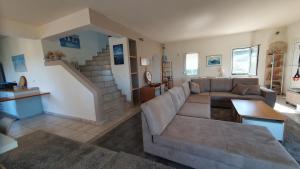 Posedenie v ubytovaní Βίλα με Υπέροχη Θέα Porto Cheli Villa Luxury Kounoupisea