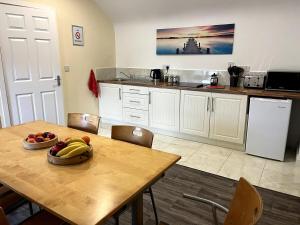 Kuchyň nebo kuchyňský kout v ubytování Surf Cottage
