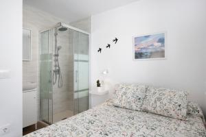 Postel nebo postele na pokoji v ubytování Atico Juani