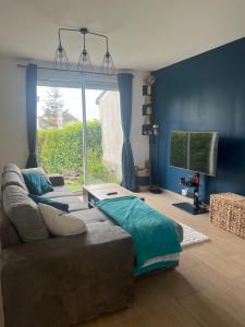 Posedenie v ubytovaní Maison familiale, quartier calme