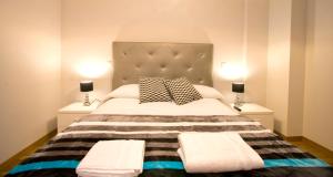 Postel nebo postele na pokoji v ubytování Apartamentos Amaiur